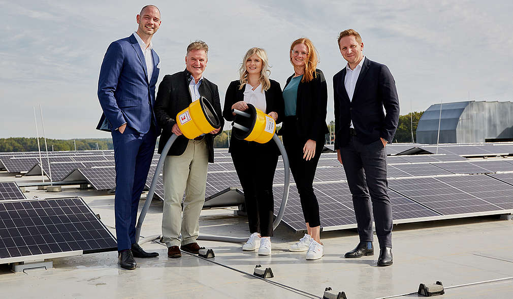 Abbildung: Mitarbeiter von Kaufland und der Hahn Gruppe