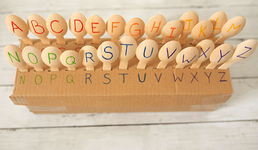 Holzstäbchen mit Buchstaben
