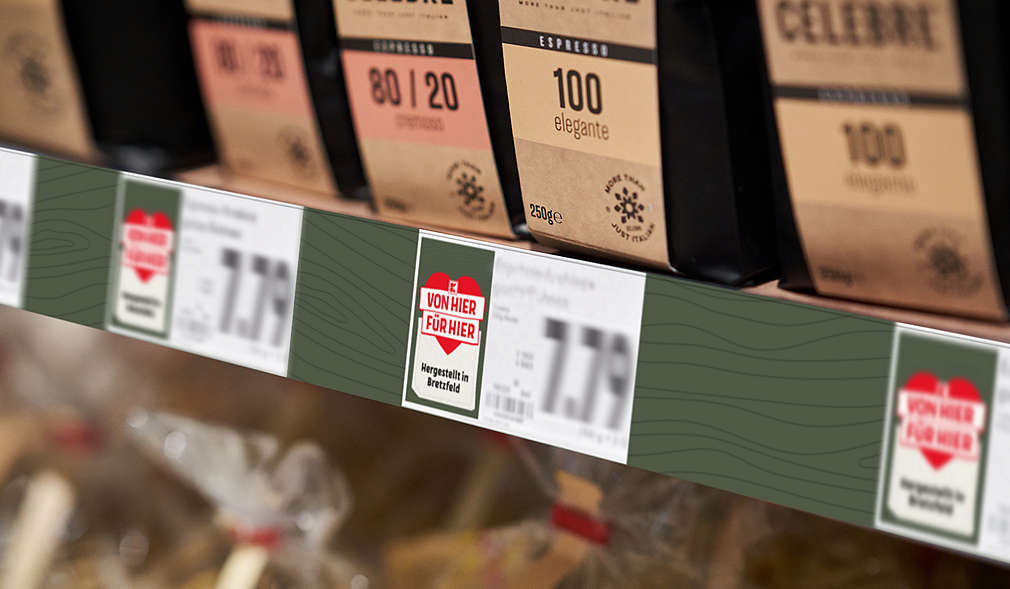 Schiene mit mehreren Etiketten, auf welchen das Regio-Herz abgebildet ist.