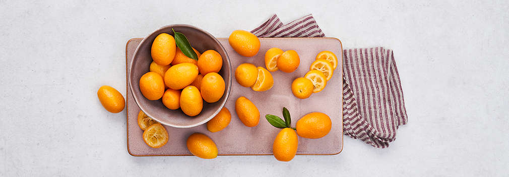 Slika svježih patuljastih naranči