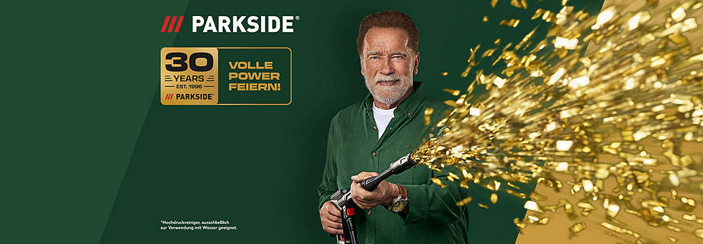 PARKSIDE Logo; Arnold Schwarzenegger mit Hochdruckreiniger von PARKSIDE, aus dem goldenes Konfetti schießt (Hochdruckreiniger ausschließlich zur Verwendung mit Wasser geeignet.); Logo: 30 years - est. 1996 - PARKSIDE
