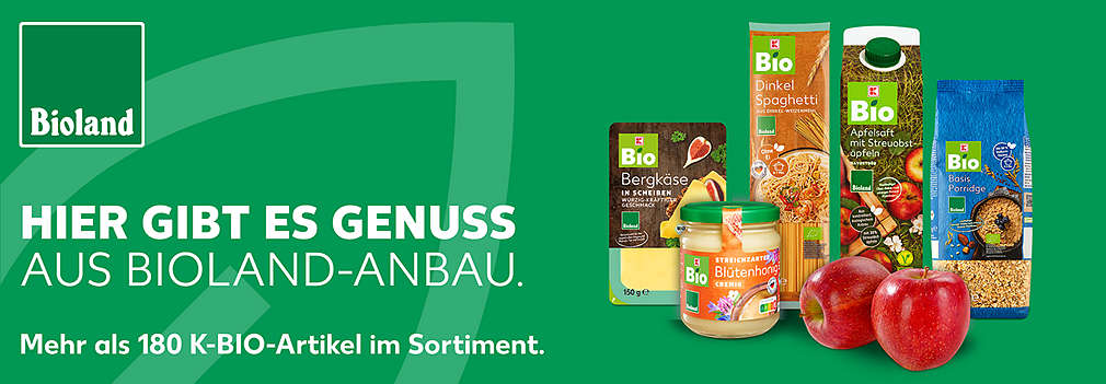 K-BIO Bioland Artikel vor grünem Hintergrund; Schriftzug: Hier gibt es Genuss aus Bioland-Anbau. Mehr als 180 K-BIO Artkel im Sortiment; Logo: Bioland