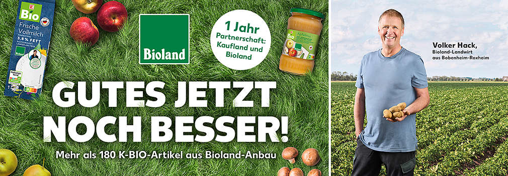 K-Bio Bioland Artikel auf einer grünen Wiese; Schriftzug: Gutes wird noch besser! Jetzt neu: K-Bio aus Bioland-Anbau; Logo: Bioland