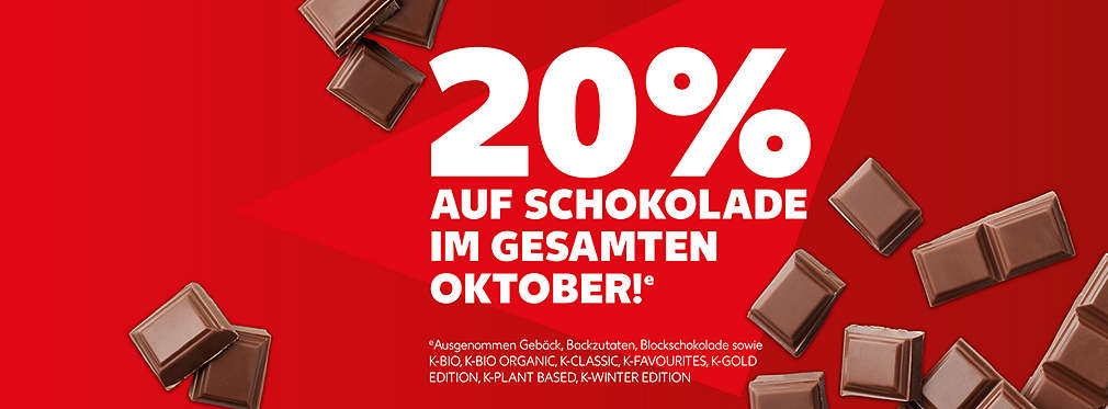 Schriftzug: Bis zu 20% auf Schokolade im gesamten Oktober. Ausgenommen sind Gebäck, Backzutaten, Blockschokolade sowie Artikel der Eigenmarken K-Bio, K-Bio Organic, K-Classic, K-Favourites, K-Gold Edition, K-Plant Based, K-Winter Edition