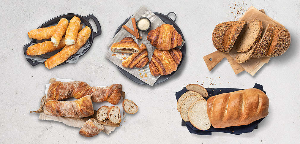 Verschiedene Backwaren wie Franzbrötchen, Kastenweißbrot und Börek