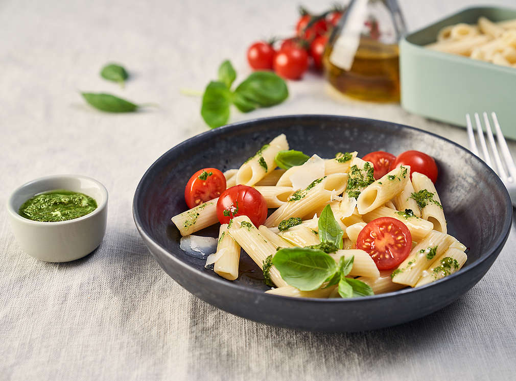 Pasta salad with tomato, basil and olive oil