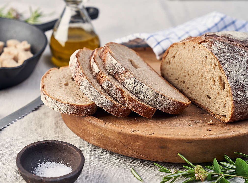 Sliced bread on a wooden board