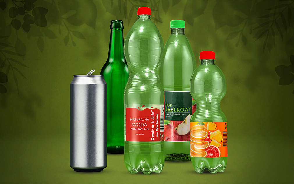 Różne puste butelki: plastikowe i szklane i puszka