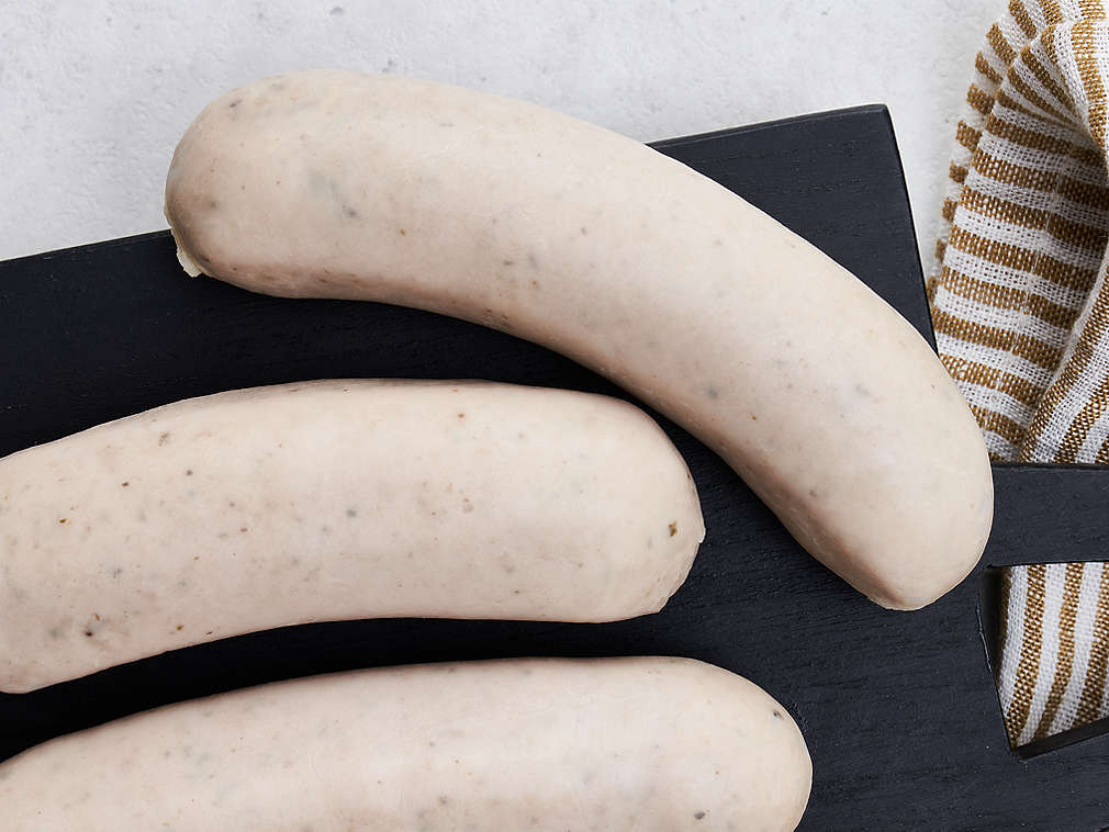 Frische Schweinsbratwurst in der Detailansicht