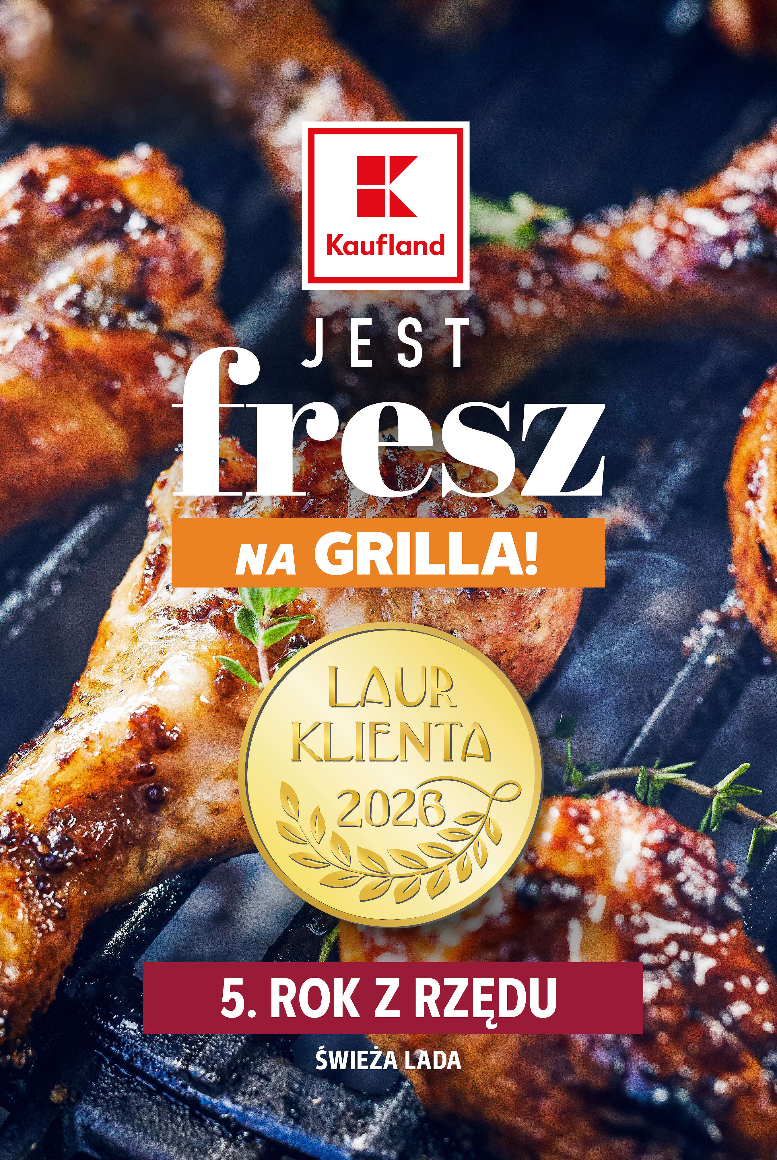 Kaufland jest FRESZ -i laur klienta 2026 na tle z kawałków mięsa