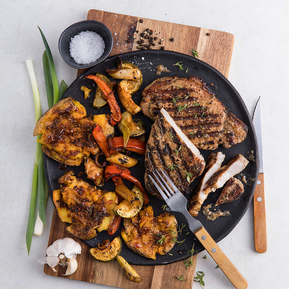 Abbildung des Rezepts Schweinesteaks mit Smashed Potatoes