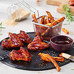 Abbildung des Rezepts Buffalo Chickenwings mit Süßkartoffel-Pommes