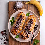 Abbildung des Rezepts Schoko-Bananen im Blätterteigmantel